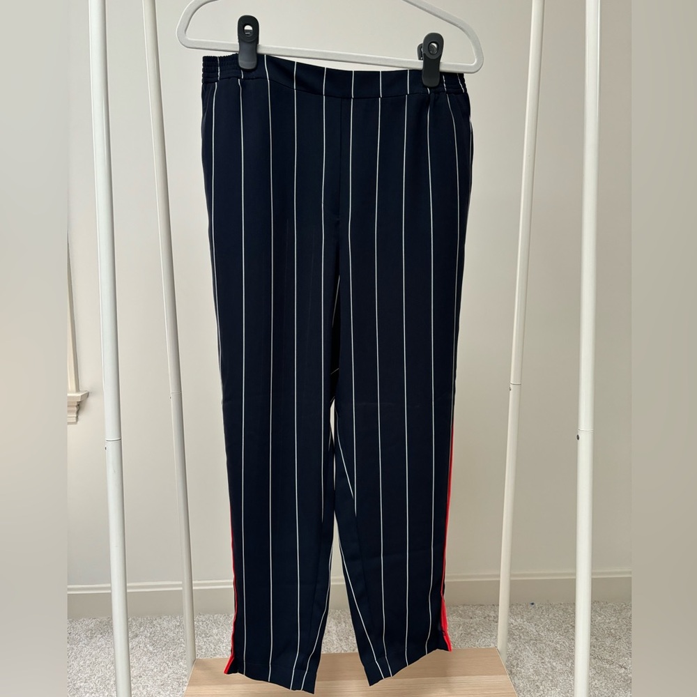 Anthropologie Pinstripe pants with neon orange side stripe - size M